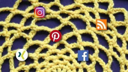 Häkelnetz auf dem Social Media Symbolen platziert sind